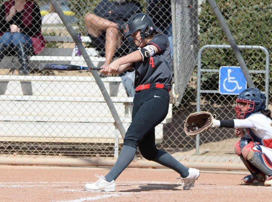 Aly Kaneshiro rounds every base for the varsity softball team during her four years at Hart.
